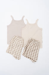 Flat lay of Avauma butter beige check tank top set – soft sleeveless tops paired with gingham shorts